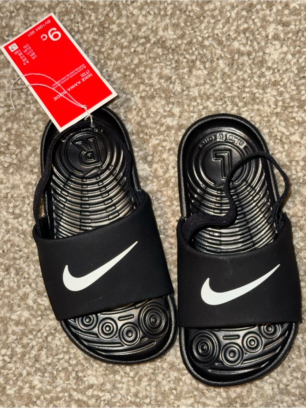 Nike Kids Black Slides with White Swoosh